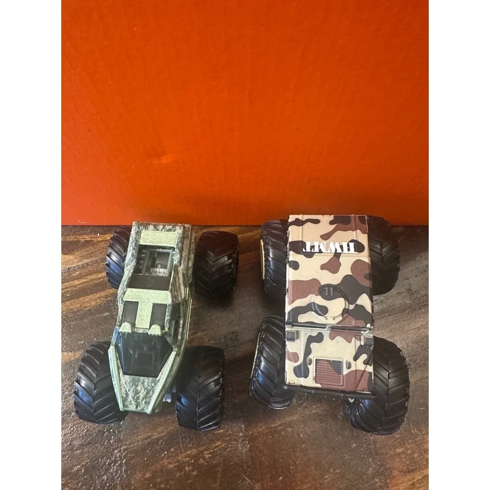 Monster Jam Soldier Fortune & Hot Wheels HWMT Humvee CamoMonster Trucks 1:64‎